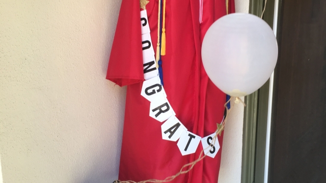 Turning Tassels: Celebrating with Graduation Caps and Gowns